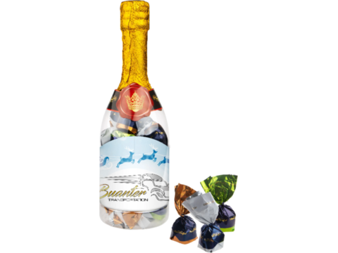 Bouteille de champagne avec des chocolates